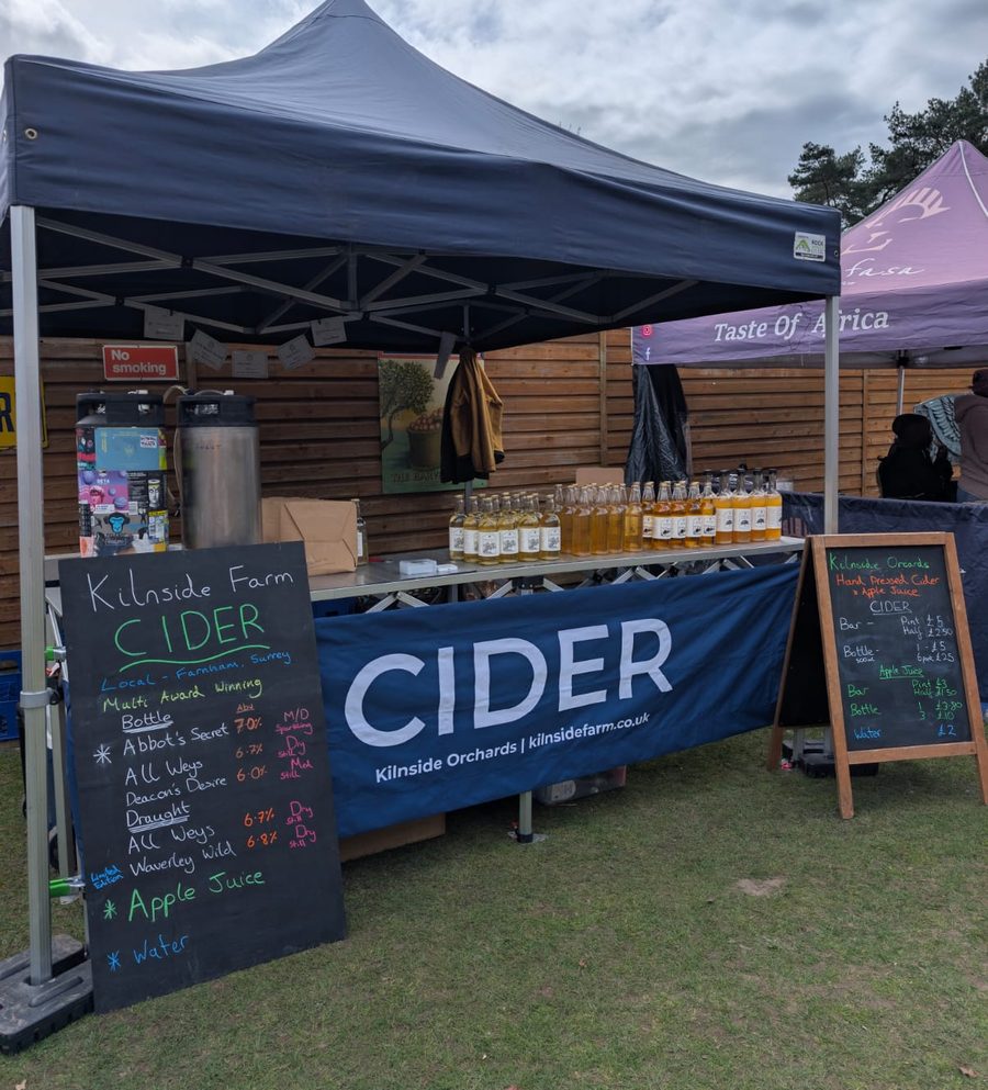 The Kilnside Farm cider stall with its chalkboard menu of ciders and apple juice